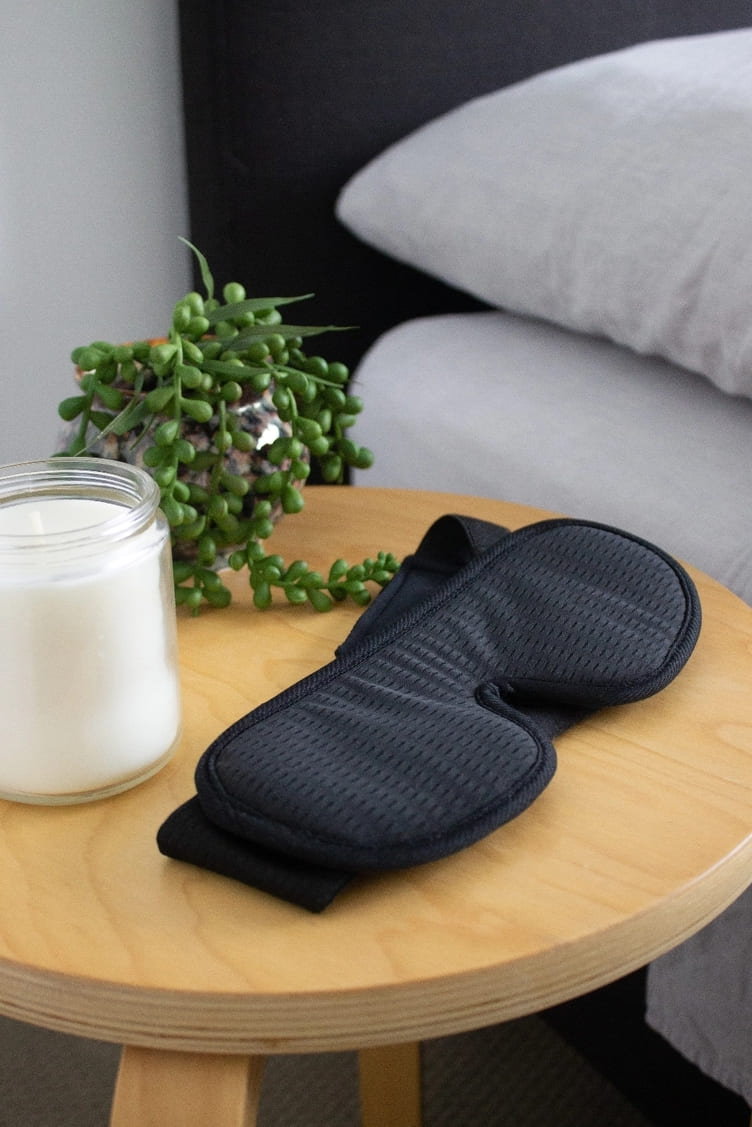 Sleep Eye Mask on bed side table